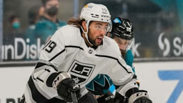 Mar 24, 2021; San Jose, California, USA; Los Angeles Kings right wing Alex Iafallo (19) chases after the puck during the first period against the San Jose Sharks at SAP Center at San Jose. Mandatory Credit: Stan Szeto-USA TODAY Sports