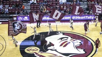 Jan 7, 2017; Tallahassee, FL, USA; Members of the Florida State Seminoles cheer squad run on to the court before defeating the Virginia Tech Hokies 93-78 at Donald L. Tucker Center. Mandatory Credit: Glenn Beil-USA TODAY Sports