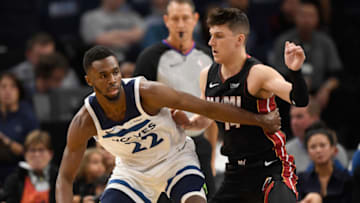MINNEAPOLIS, MINNESOTA - OCTOBER 27: Tyler Herro #14 of the Miami Heat defends against Andrew Wiggins #22 of the Minnesota Timberwolves. (Photo by Hannah Foslien/Getty Images)