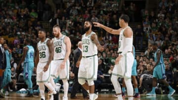 BOSTON, MA - NOVEMBER 10: Marcus Morris #13 and Jayson Tatum #0 of the Boston Celtics high five during the game against the Charlotte Hornets on November 10, 2017 at the TD Garden in Boston, Massachusetts. NOTE TO USER: User expressly acknowledges and agrees that, by downloading and or using this photograph, User is consenting to the terms and conditions of the Getty Images License Agreement. Mandatory Copyright Notice: Copyright 2017 NBAE (Photo by Brian Babineau/NBAE via Getty Images)