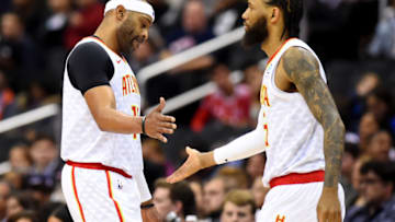 WASHINGTON, DC - JANUARY 2: Vince Carter #15 of the Atlanta Hawks celebrates with DeAndre' Bembry #95 of the Atlanta Hawks during the first half against the Washington Wizards at Capital One Arena on January 2, 2019 in Washington, DC. NOTE TO USER: User expressly acknowledges and agrees that, by downloading and or using this photograph, User is consenting to the terms and conditions of the Getty Images License Agreement. (Photo by Will Newton/Getty Images)