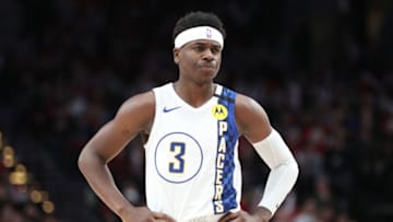 PORTLAND, OREGON - JANUARY 26: Aaron Holiday #3 of the Indiana Pacers reacts in the first quarter against the Portland Trail Blazers during their game at Moda Center on January 26, 2020 in Portland, Oregon. NOTE TO USER: User expressly acknowledges and agrees that, by downloading and or using this photograph, User is consenting to the terms and conditions of the Getty Images License Agreement (Photo by Abbie Parr/Getty Images)
