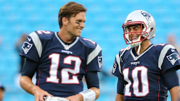 New England Patriots quarterback Tom Brady (12) and quarterback Jimmy Garoppolo share a laugh during warm ups Mandatory Credit: Jim Dedmon-USA TODAY Sports