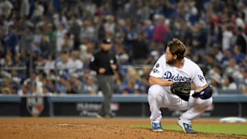 LOS ANGELES, CALIFORNIA - OCTOBER 09: Clayton Kershaw #22 of the Los Angeles Dodgers reacts after giving up a solo home run to Juan Soto #22 of the Washington Nationals in the eighth inning of game five of the National League Division Series, to tie the game 3-3, at Dodger Stadium on October 09, 2019 in Los Angeles, California. (Photo by Harry How/Getty Images)