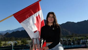 INDIAN WELLS, CA - MARCH 17: Bianca Andreescu of Canada poses with the championship trophy after her three set victory against Angelique Kerber of Germany in the women's final on day fourteen of the BNP Paribas Open at the Indian Wells Tennis Garden on March 17, 2019 in Indian Wells, California. (Photo by Kevork Djansezian/Getty Images)