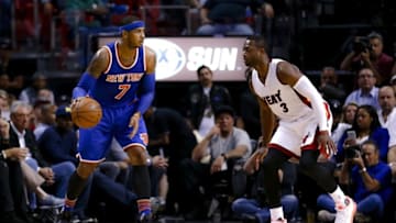 Nov 23, 2015; Miami, FL, USA; New York Knicks forward Carmelo Anthony (7) is pressures by Miami Heat guard Dwyane Wade (3) during the first half at American Airlines Arena. Mandatory Credit: Steve Mitchell-USA TODAY Sports