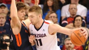 Dec 21, 2015; Spokane, WA, USA; Gonzaga Bulldogs forward Domantas Sabonis (11) goes up against Pepperdine Waves center Ryan Keenan (44) during the second half at McCarthey Athletic Center. The Bulldogs won 99-73. Mandatory Credit: James Snook-USA TODAY Sports