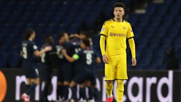 PARIS, FRANCE - MARCH 11: (FREE FOR EDITORIAL USE) In this handout image provided by UEFA, Jadon Sancho of Borussia Dortmund reacts to PSG scoring their second goal during the UEFA Champions League round of 16 second leg match between Paris Saint-Germain and Borussia Dortmund at Parc des Princes on March 11, 2020 in Paris, France. The match is played behind closed doors as a precaution against the spread of COVID-19 (Coronavirus). (Photo by UEFA - Handout/UEFA via Getty Images)