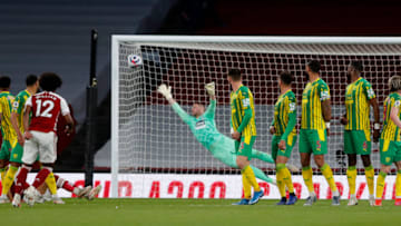 LONDON, ENGLAND - MAY 09: Willian of Arsenal scores their side's third goal during the Premier League match between Arsenal and West Bromwich Albion at Emirates Stadium on May 09, 2021 in London, England. Sporting stadiums around the UK remain under strict restrictions due to the Coronavirus Pandemic as Government social distancing laws prohibit fans inside venues resulting in games being played behind closed doors. (Photo by Frank Augstein - Pool/Getty Images)