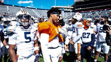 Auburn football quarterback Robby Ashford (9) huddles with his team during the A-Day spring practice at Jordan-Hare Stadium in Auburn, Ala., on Saturday, April 9, 2022.