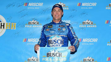 PHOENIX, AZ - NOVEMBER 09: Kevin Harvick, driver of the #4 Busch Light Ford, poses with the Busch Pole Award after posting the fastest lap during qualifying for the Monster Energy NASCAR Cup Series Can-Am 500 at ISM Raceway on November 9, 2018 in Phoenix, Arizona. (Photo by Jared C. Tilton/Getty Images)