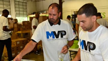 ORLANDO, FL - SEPTEMBER 6: Frank Vogel of the Orlando Magic helps with Hurricane Harvey Relief on September 6, 2017 at Clean the World in Orlando, Florida. NOTE TO USER: User expressly acknowledges and agrees that, by downloading and or using this photograph, User is consenting to the terms and conditions of the Getty Images License Agreement. Mandatory Copyright Notice: Copyright 2017 NBAE (Photo by Fernando Medina/NBAE via Getty Images)