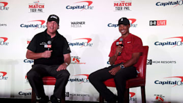 LAS VEGAS, NV - NOVEMBER 20: (L-R) Phil Mickelson and Tiger Woods speak with the media during a press conference before The Match at Shadow Creek Golf Course on November 20, 2018 in Las Vegas, Nevada. (Photo by Harry How/Getty Images for The Match)