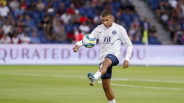 PARIS, FRANCE - AUGUST 25: Kylian Mbappe #7 of Paris Saint-Germain warms up before the Ligue 1 match between Paris Saint-Germain and Toulouse FC at Parc des Princes on August 25, 2019 in Paris, France. (Photo by Catherine Steenkeste/Getty Images)