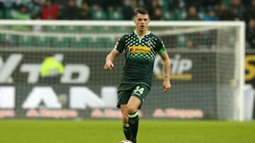 WOLFSBURG, GERMANY - MARCH 05: Granit Xhaka of Moenchengladbach runs with the ball during the Bundesliga match between VFL Wolfsburg and Borussia Moenchengladbach at Volkswagen Arena on March 5, 2016 in Wolfsburg, Germany. (Photo by Matthias Kern/Bongarts/Getty Images)