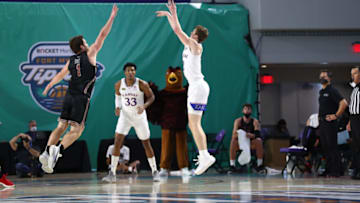 Kansas basketball guard Christian Braun (2) makes a basket over Saint Joseph's. Mandatory Credit: Kim Klement-USA TODAY Sports