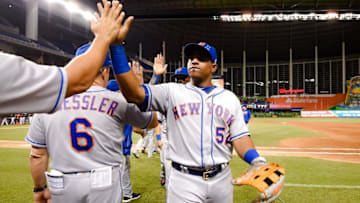 Sep 28, 2016; Miami, FL, USA; New York Mets left fielder Yoenis Cespedes (52) celebrates their 5-2 win over the Miami Marlins at Marlins Park. Mandatory Credit: Steve Mitchell-USA TODAY Sports