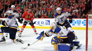 CHICAGO, IL - FEBRUARY 26: St. Louis Blues goalie Jake Allen (34) blocks a shot with his stick during the first period of a game between the Chicago Blackhawks and the St. Louis Blues on February 26, 2017, at the United Center in Chicago, IL. (Photo by Robin Alam/Icon Sportswire via Getty Images)