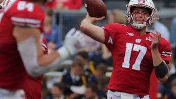 Wisconsin quarterback Jack Coan (17) thows a pass to tight end Jake Ferguson during the third quarter of their game Saturday, September 7, 2019 at Camp Randall in Madison, Wis. Wisconsin beat Central Michigan 61-0.Mjs Uwgrid08 58 Hoffman Jpg Uwgrid08