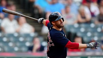 CLEVELAND, OHIO - AUGUST 28: J.D. Martinez #28 of the Boston Red Sox hits a three-run home run in the tenth inning during their game against the Cleveland Indians at Progressive Field on August 28, 2021 in Cleveland, Ohio. (Photo by Emilee Chinn/Getty Images)