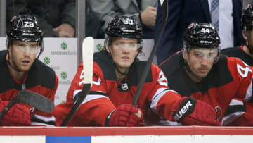 NEWARK, NJ - DECEMBER 18: New Jersey Devils center Jesper Boqvist (90) on the bench during the National Hockey League game between the New Jersey Devils and the Anaheim Ducks on December 18, 2019 at the Prudential Center in Newark, N J. (Photo by Rich Graessle/Icon Sportswire via Getty Images)