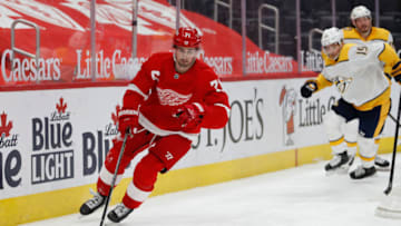 Feb 25, 2021; Detroit, Michigan, USA; Detroit Red Wings center Dylan Larkin (71) skates with the puck during the third period against the Nashville Predators at Little Caesars Arena. Mandatory Credit: Raj Mehta-USA TODAY Sports
