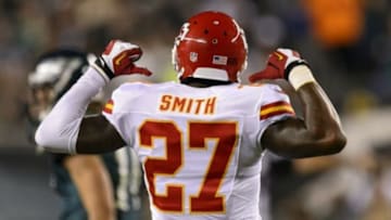 Sep 19, 2013; Philadelphia, PA, USA; Kansas City Chiefs cornerback Sean Smith (27) celebrates making an interception during the second quarter against the Philadelphia Eagles at Lincoln Financial Field. Mandatory Credit: Howard Smith-USA TODAY Sports