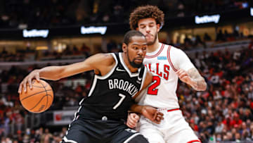 Nov 8, 2021; Chicago, Illinois, USA; Brooklyn Nets forward Kevin Durant (7) drives to the basket against Chicago Bulls guard Lonzo Ball (2) during the second half at United Center. Mandatory Credit: Kamil Krzaczynski-USA TODAY Sports