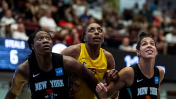 WHITE PLAINS, NY- JULY 20: Nneka Ogwumike #30 of the Los Angeles Sparks is boxed out by Tina Charles #31 and Kia Nurse #5 of the New York Liberty on July 20, 2019 at the Westchester County Center in White Plains, New York. NOTE TO USER: User expressly acknowledges and agrees that, by downloading and or using this photograph, User is consenting to the terms and conditions of the Getty Images License Agreement. Mandatory Copyright Notice: Copyright 2019 NBAE (Photo by Michelle Farsi/NBAE via Getty Images)
