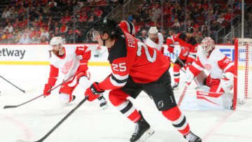 NEWARK, NJ - APRIL 24: Nolan Foote #25 of the New Jersey Devils skates during the game against the Detroit Red Wings on April 24, 2022 at the Prudential Center in Newark, New Jersey. (Photo by Rich Graessle/Getty Images)
