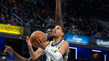 Nov 21, 2022; Indianapolis, Indiana, USA; Indiana Pacers guard Tyrese Haliburton (0) shoots the ball while Orlando Magic center Mo Bamba (11) defends in the second quarter at Gainbridge Fieldhouse. Mandatory Credit: Trevor Ruszkowski-USA TODAY Sports