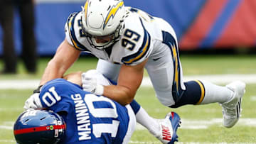EAST RUTHERFORD, NJ - OCTOBER 08: Joey Bosa #99 of the Los Angeles Chargers sacks Eli Manning #10 of the New York Giants during their game at MetLife Stadium on October 8, 2017 in East Rutherford, New Jersey. (Photo by Jeff Zelevansky/Getty Images)