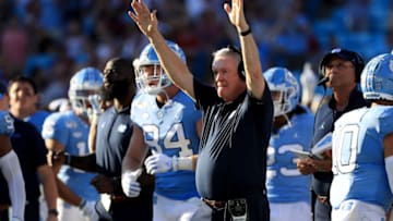 CHARLOTTE, NORTH CAROLINA - AUGUST 31: Head coach Mack Brown of the North Carolina Tar Heels reacts after his team scores against the South Carolina Gamecocks during the Belk College Kickoff game at Bank of America Stadium on August 31, 2019 in Charlotte, North Carolina. (Photo by Streeter Lecka/Getty Images)