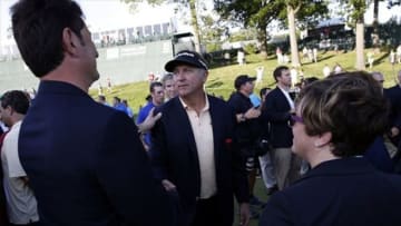 Jun 23, 2013; Cromwell, CT, USA; Ken Duke is congratulated by members of the Travelers Championship organization after winning the Travelers Championship at TPC at River Highlands. Mandatory Credit: David Butler II-USA TODAY Sports