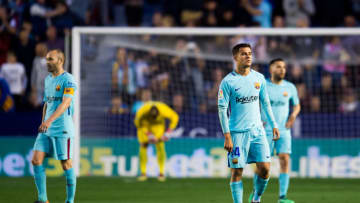 VALENCIA, SPAIN - MAY 13: Andres Iniesta and Philippe Coutinho of FC Barcelona react after Emmanuel Boateng of Levante UD scored his team's second goal during the La Liga match between Levante UD and FC Barcelona at Estadi Ciutat de Valencia on May 13, 2018 in Valencia, Spain. (Photo by Alex Caparros/Getty Images)