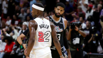 Jimmy Butler #22 of the Miami Heat and Paul George #13 of the LA Clippers meet on the court after their game(Photo by Megan Briggs/Getty Images)