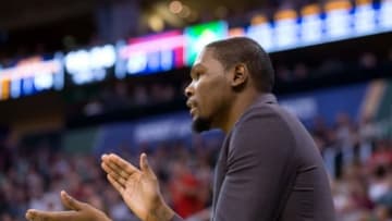 Nov 18, 2014; Salt Lake City, UT, USA; Oklahoma City Thunder forward Kevin Durant (35) reacts from the bench during the first half against the Utah Jazz at EnergySolutions Arena. The Jazz won 98-81. Mandatory Credit: Russ Isabella-USA TODAY Sports