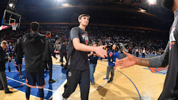 NEW YORK, NY - MARCH 11: Luke Kornet #2 of the New York Knicks makes his entrance before the game against the Toronto Raptors on March 11, 2018 at Madison Square Garden in New York, NY. NOTE TO USER: User expressly acknowledges and agrees that, by downloading and or using this photograph, User is consenting to the terms and conditions of the Getty Images License Agreement. Mandatory Copyright Notice: Copyright 2018 NBAE (Photo by Jesse D. Garrabrant/NBAE via Getty Images)
