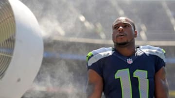 Sep 14, 2014; San Diego, CA, USA; Seattle Seahawks wide receiver Percy Harvin (11) stands next to a mist fan before the game against the San Diego Chargers at Qualcomm Stadium. Mandatory Credit: Jake Roth-USA TODAY Sports