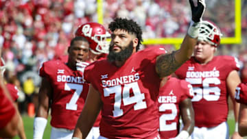 NORMAN, OK - SEPTEMBER 014: Offensive lineman Cody Ford #74 of the Oklahoma Sooners engages the crowd before the game against the Florida Atlantic Owls at Gaylord Family Oklahoma Memorial Stadium on September 1, 2018 in Norman, Oklahoma. The Sooners defeated the Owls 63-14. (Photo by Brett Deering/Getty Images)