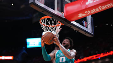 MIAMI, FLORIDA - OCTOBER 11: Miles Bridges #0 of the Charlotte Hornets drives to the basket against the Miami Heat during a preseason game at FTX Arena on October 11, 2021 in Miami, Florida. NOTE TO USER: User expressly acknowledges and agrees that, by downloading and/or using this Photograph, user is consenting to the terms and conditions of the Getty Images License Agreement. (Photo by Mark Brown/Getty Images)