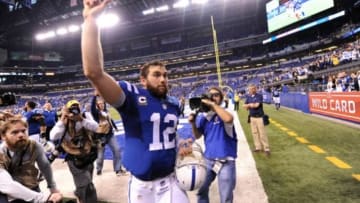 Jan 4, 2015; Indianapolis, IN, USA; Indianapolis Colts quarterback Andrew Luck (12) waves to the crowd as he leaves the field after the 2014 AFC Wild Card playoff football game against the Cincinnati Bengals at Lucas Oil Stadium. Mandatory Credit: Thomas J. Russo-USA TODAY Sports