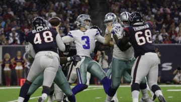 HOUSTON, TX - AUGUST 30: Mike White #3 of the Dallas Cowboys looks to pass under pressure by Darius Kilgo #96 of the Houston Texans in the second half of the preseason game at NRG Stadium on August 30, 2018 in Houston, Texas. (Photo by Tim Warner/Getty Images)