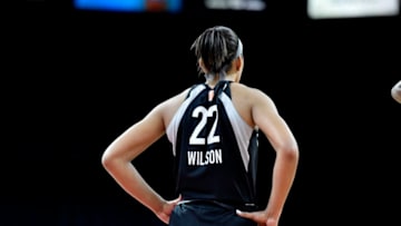 LAS VEGAS, NV - JULY 7: A'ja Wilson #22 of the Las Vegas Aces looks on against the Connecticut Sun on July 7, 2018 at the Mandalay Bay Events Center in Las Vegas, Nevada. NOTE TO USER: User expressly acknowledges and agrees that, by downloading and or using this Photograph, user is consenting to the terms and conditions of the Getty Images License Agreement. Mandatory Copyright Notice: Copyright 2018 NBAE (Photo by David Becker/NBAE via Getty Images)