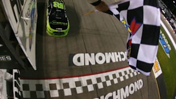 RICHMOND, VA - SEPTEMBER 08: Brad Keselowski, driver of the #22 Fitzgerald Glider Kits Ford, crosses the finish line to win the NASCAR XFINITY Series Virginia529 College Savings 250 at Richmond International Raceway on September 8, 2017 in Richmond, Virginia. (Photo by Sarah Crabill/Getty Images)