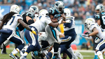 Dec 11, 2016; Charlotte, NC, USA; Carolina Panthers running back Jonathan Stewart (28) runs the ball during the first quarter against the San Diego Chargers at Bank of America Stadium. Mandatory Credit: Jeremy Brevard-USA TODAY Sports