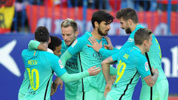 MADRID, SPAIN - FEBRUARY 26: Lionel Messi of FC Barcelona celebratea with teammates after scoring his 2nd goal during the La Liga match between Club Atletico de Madrid and FC Barcelona at Vicente Calderon Stadium on February 26, 2017 in Madrid, Spain. (Photo by Denis Doyle/Getty Images)