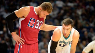 Oct 14, 2015, Shanghai, China; Los Angeles Clippers forward Blake Griffin (32) and Charlotte Hornets center Frank Kaminsky (44) in action as the Los Angeles Clippers take on the Charlotte Hornets at Mercedes-Benz Arena. Hornets beat the Clippers by a score of 113-71. Mandatory Credit: Danny La-USA Today Sports