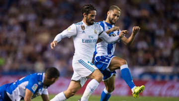 LA CORUNA, SPAIN - AUGUST 20: Florin Andone of RC Deportivo La Coruna competes for the ball with Isco of Real Madrid during the La Liga match between Deportivo La Coruna and Real Madrid at Riazor Stadium on August 20, 2017 in La Coruna, Spain. (Photo by Octavio Passos/Getty Images)