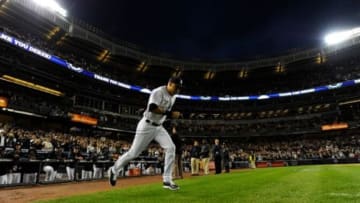 Sep 25, 2014; Bronx, NY, USA; New York Yankees shortstop Derek Jeter (2) takes the field for the last time at Yankee Stadium prior to the game against the Baltimore Orioles. Mandatory Credit: Robert Deutsch-USA TODAY Sports